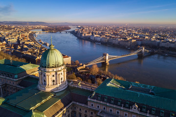 Fototapeta na wymiar Budapest, Hungary - Aerial skyline view of Budapest with Buda Castle Royal Palace, Szechenyi Chain Bridge and Margaret Island early in the morning with clear blue sky