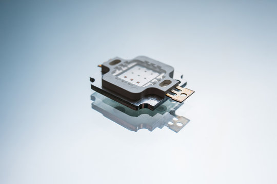electronic micro detail on white background. component for robotics engineering. technology innovation.