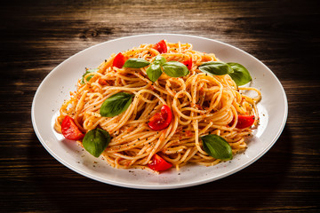 Pasta with meat, tomato sauce and vegetables