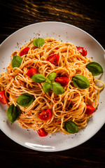 Pasta with meat, tomato sauce and vegetables
