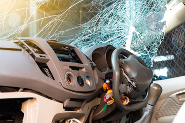 In the car, the steering wheel bent from the accident.