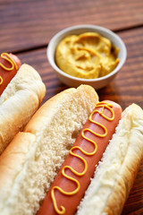 hot dog with mustard