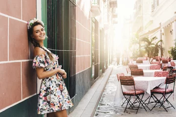 Foto op Canvas Happy woman in beautiful dress on the street © blackday