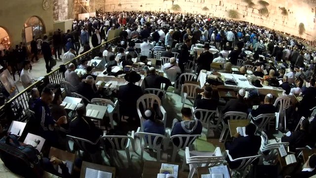 Hyperlapse Prayer at the Western Wall Ultra-Orthodox Jews pray at the Western Wall in Jerusalem on the eve of Yom Kippur