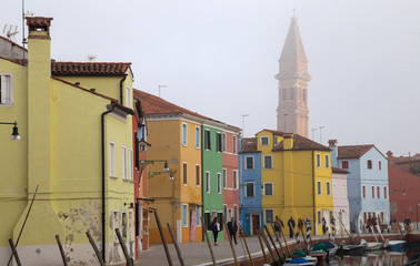 Fototapeta na wymiar VENICE (VENEZIA) ITALY, OCTOBER 17, 2017 - View of Burano island in a foggy day, a small island inside Venice area, famous for lace making and its colorful houses