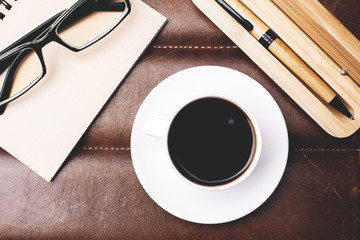 Table with coffee, glasses and supplies
