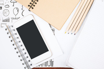 Desktop with empty cellphone and supplies