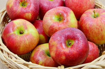 many apples in wooden basket