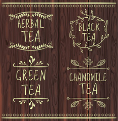 Fototapety  Tea drawn VECTOR label templates on brown wooden background