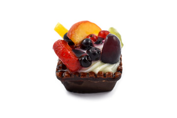 Fruit cake stock images. Fruit tart on a white background. Fruit tart mini. Fruit cup with cream