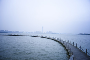 Fototapeta na wymiar A bridge with blurred city background