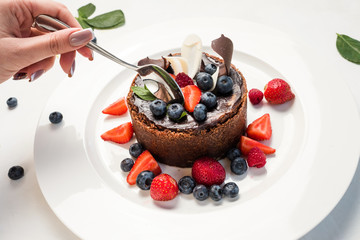 tasting sweet chocolate cake dessert recipe concept. restaurant food. delicious pastries. confectionery products.