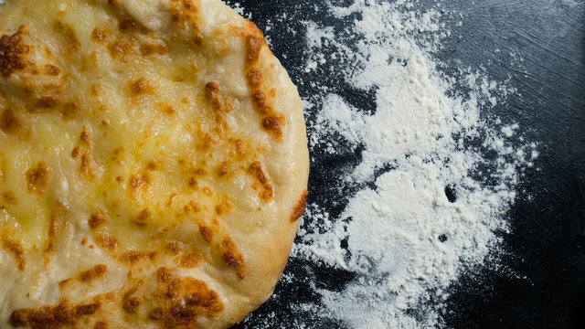 Mingrelian or megruli khachapuri is traditional Georgian cuisine meal. Baked bread with cheese filling. National pastry snack