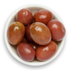 olives in white bowl on white background