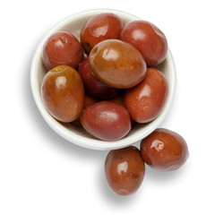 olives in white bowl on white background