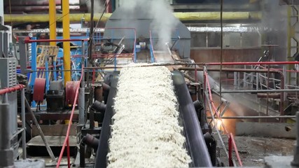 Industrial premises sugar factory. Sugar refinery. Industrial buildings exterior, production of sugar from sugar beets