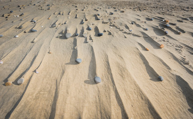 Fototapeta premium Stones and Drifts in Sand