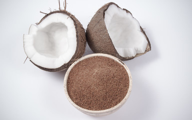 Fototapeta na wymiar Coconut with coconut sugar isolated on white background.