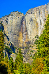 View of Yosemite Falls from Yosemite Valley in Yosemite National Park in autumn.