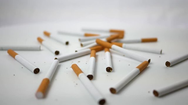 Spinning generic cigarettes spinning over white ALT 2 Version