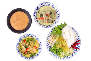 Isolated of Popular Thai food, Rice noodle and green chicken curry in coconut milk call Kha Nom Jeen Kaeng Kai in Thai served on Thai Pattern dish.

