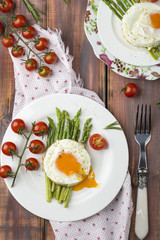 green asparagus with fried eggs