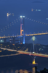 Tsing ma Bridge and Ting Kau Bridge in Hong Kong city at dusk