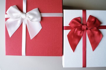  Valentine present. Gift box and red ribbon for romantic couple.