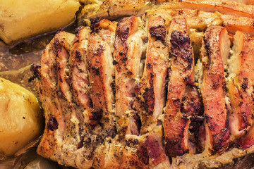 Gourmet Seasoned Pork Ham Chunk Stuffed With Bacon And Partially Sliced Freshly Oven Baked With Whole Red Potatoes In Natural Gravy Detail