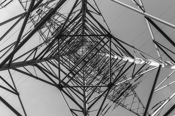 electric pylons transporting electricity through high tension cables
