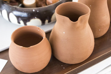 Fototapeta na wymiar Traditional handmade bottle design from clay