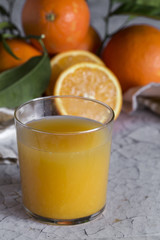 Fresh orange juice in glass cup