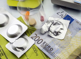 Pastilla effervescent next to medication daily on a ticket of 200 euros, concept of copayment health