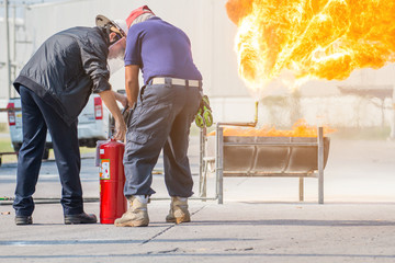 Fototapeta premium Firefighter training, The Employees Annual training Fire fighting with gas and flame