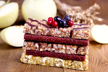 Healthy Food Snack Muesli Bars Pile of Mueslies Bars Wooden Background Close Up