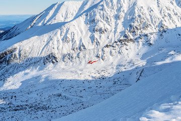 Rescue helicopter in the high Tatras. Day foto