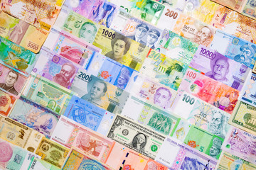 Different various money background. Many cash banknotes