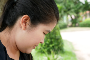 Side View of Young Asian Woman Face