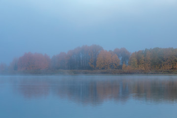 Foggy Sunrise Reflection in the Tetons in Autumn