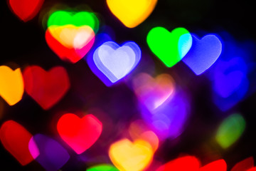 Fototapeta premium Multicolor Hearts Background with Bright Bokeh Lights for Valentine's Day