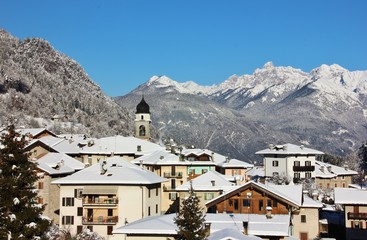 Fototapeta na wymiar Alpine village of Bondo, Sella Giudicarie (TN), Trentino Alto Adige. Italy. Snowy landscape