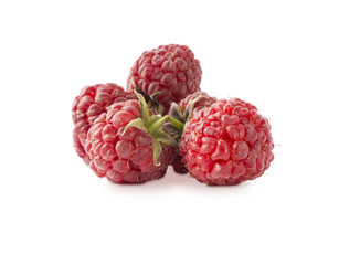 Raspberries isolated on white. Raspberry close-up. Vegetarian or healthy eating. Juicy and delicious raspberries on a white background.