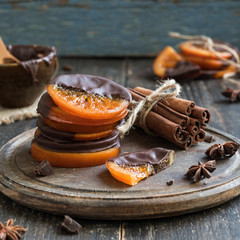 Christmas sweets, oranges in chocolate