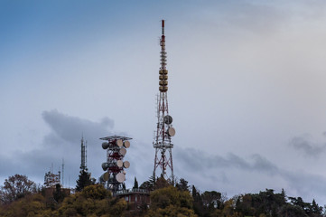 Telecommunication Radio Antenna and Satelite Tower with blue sky