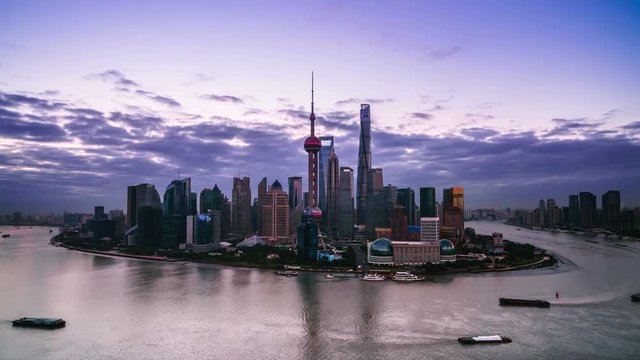 4K: Aerial view of Shanghai skyline from skyscraper(dawn to sunrise).