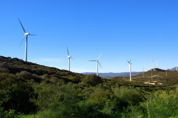 Wind turbines on the green hills of Andalusia