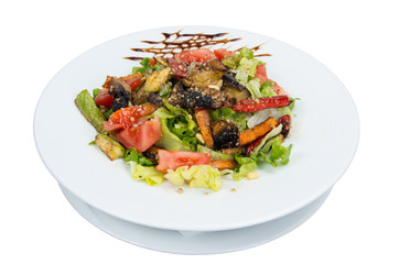 Salad. Vegetables baked on barbecue. On a white background.