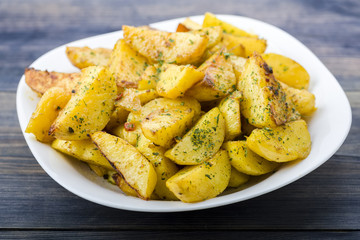 Plate with roasted potatoes