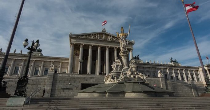 VIENNA, AUSTRIA – DECEMBER 2015 : Moving timelapse / hyperlapse of Vienna Parliament with Day to Night transition