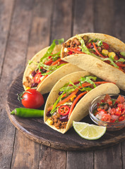 Mexican tacos with beef, vegetables and spices